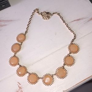 Francesca’s light orange chunky necklace